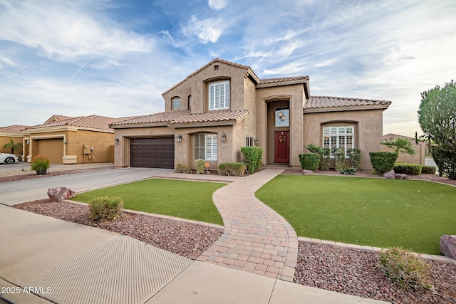 mediterranean / spanish home featuring a front lawn and a garage