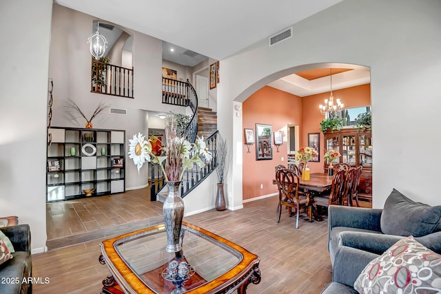 living room featuring a chandelier