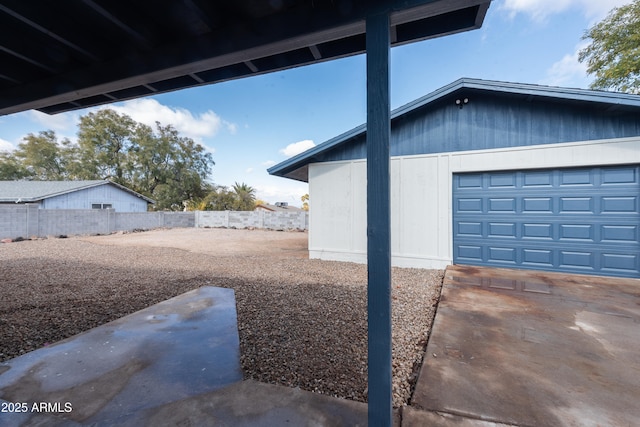 view of side of property featuring a garage