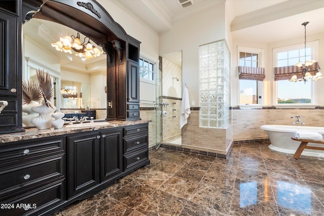 bathroom with crown molding, plus walk in shower, a healthy amount of sunlight, and tile walls