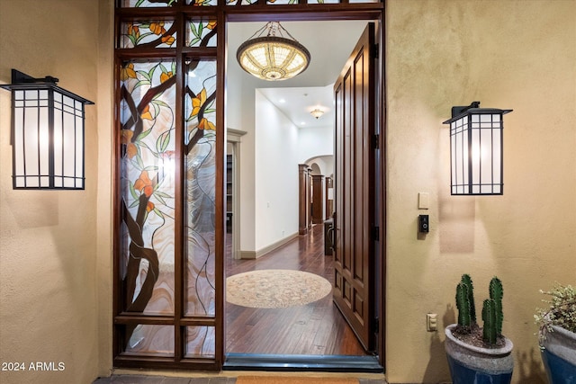 hallway featuring hardwood / wood-style flooring