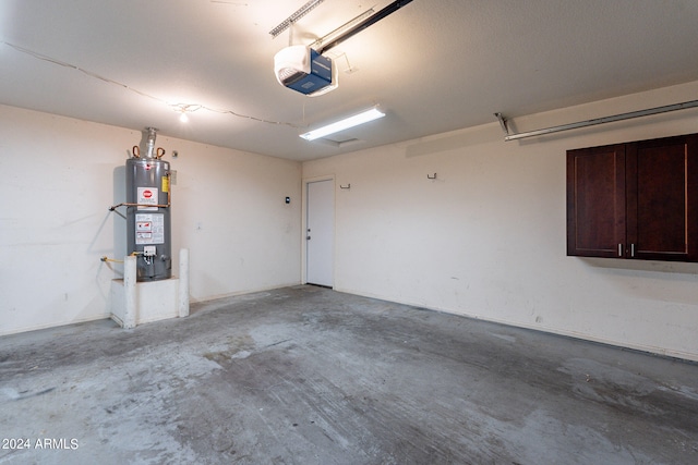 garage with a garage door opener and water heater