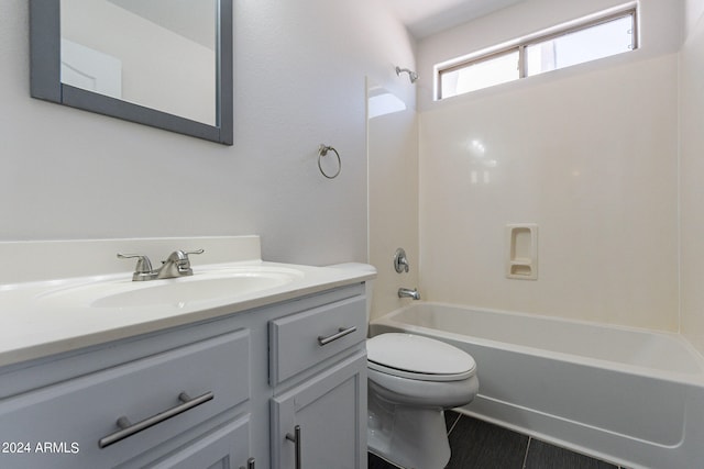 full bathroom featuring tile patterned flooring, shower / bathtub combination, vanity, and toilet