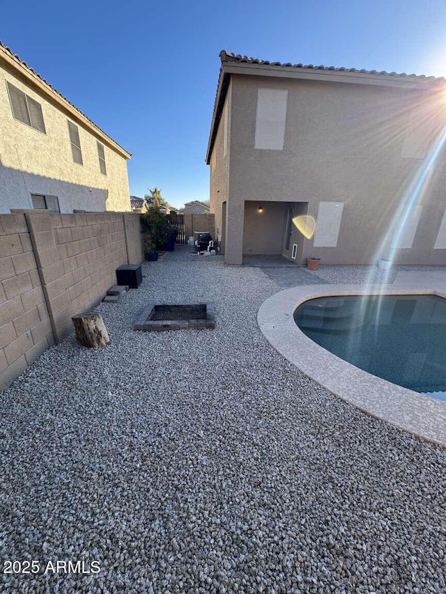 rear view of house with a patio