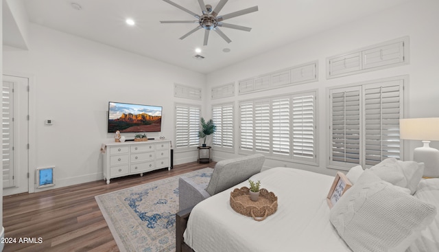 bedroom featuring dark hardwood / wood-style floors and ceiling fan