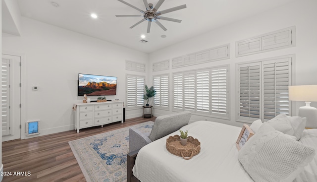 6429 S Honor Ct, Gilbert, AZ 85298 - bedroom with wood finished floors, baseboards, recessed lighting, and a ceiling fan