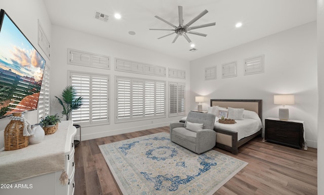 6429 S Honor Ct, Gilbert, AZ 85298 - bedroom with wood finished floors, recessed lighting, and a ceiling fan