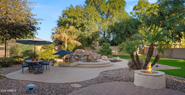 6429 S Honor Ct, Gilbert, AZ 85298 - fenced backyard with an outdoor fire pit and a patio area