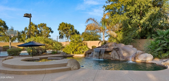 view of property's community featuring a fenced backyard