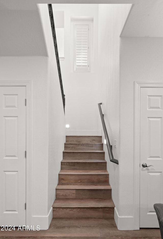 6429 S Honor Ct, Gilbert, AZ 85298 - staircase featuring baseboards and wood finished floors