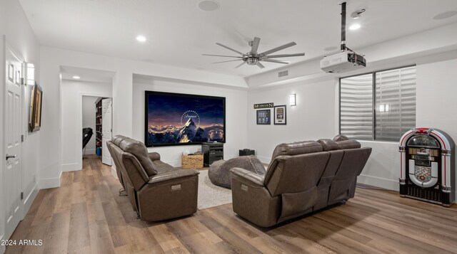 6429 S Honor Ct, Gilbert, AZ 85298 - home theater with a ceiling fan, wood finished floors, recessed lighting, and baseboards