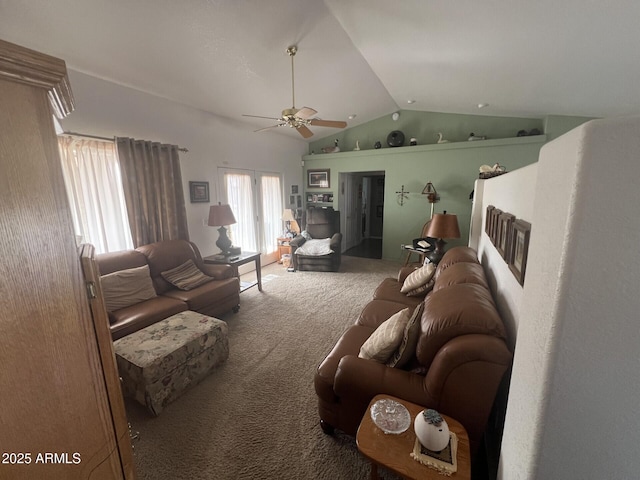 living room with vaulted ceiling, carpet, and ceiling fan