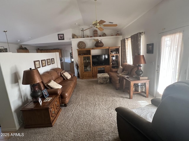 carpeted living room featuring lofted ceiling and ceiling fan