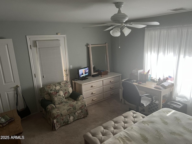 carpeted bedroom with ceiling fan