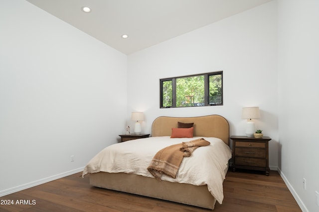 bedroom featuring recessed lighting, baseboards, and wood finished floors