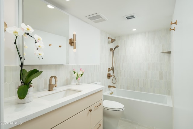 full bathroom with vanity, toilet, washtub / shower combination, and visible vents