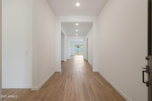 corridor featuring light wood-type flooring