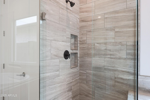 bathroom with an enclosed shower