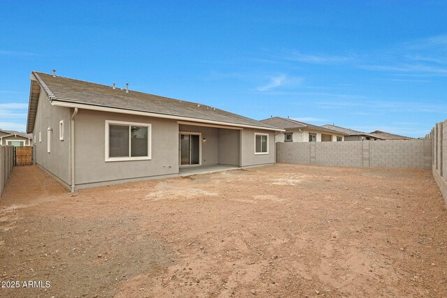 rear view of property with a patio