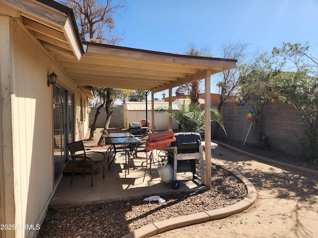 view of patio / terrace featuring area for grilling and a fenced backyard