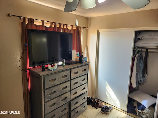 bedroom featuring light tile patterned floors