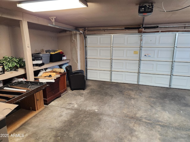 garage featuring a garage door opener