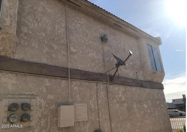 3840 N 43rd Ave Unit 16, Phoenix, AZ 85031 - details with electric meter and stucco siding