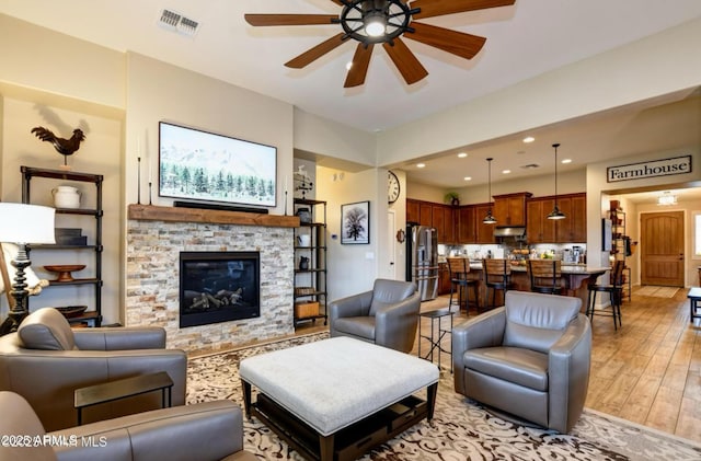 707 Lunar View Way, Chino Valley, AZ 86323 - living area featuring ceiling fan, recessed lighting, light wood finished floors, and a fireplace