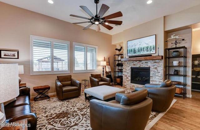 707 Lunar View Way, Chino Valley, AZ 86323 - living area featuring ceiling fan, a fireplace, light wood-style flooring, healthy amount of natural light, and recessed lighting