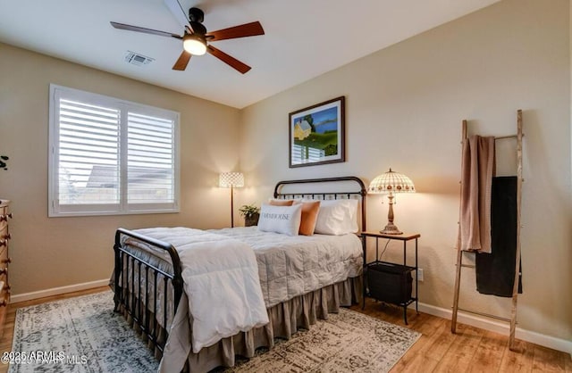 707 Lunar View Way, Chino Valley, AZ 86323 - bedroom with wood finished floors, baseboards, and a ceiling fan