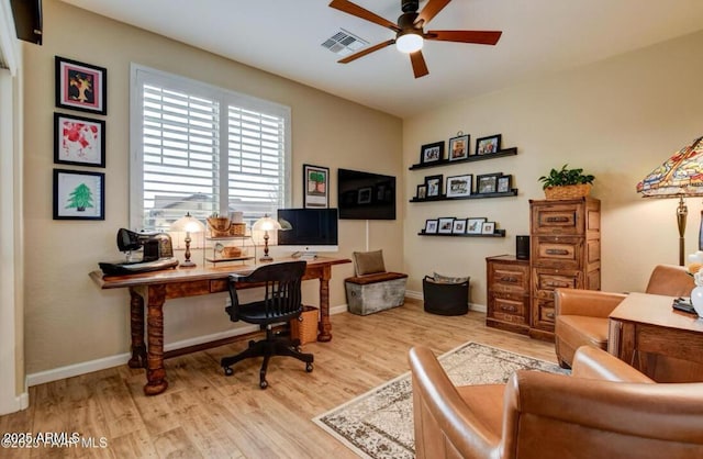 707 Lunar View Way, Chino Valley, AZ 86323 - office area featuring a ceiling fan, wood finished floors, and baseboards