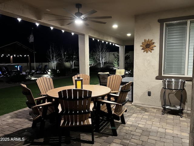 707 Lunar View Way, Chino Valley, AZ 86323 - patio at twilight with outdoor dining area, a patio area, and a ceiling fan