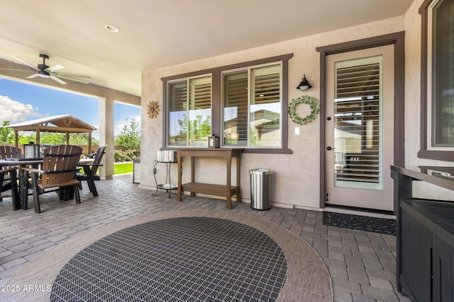 707 Lunar View Way, Chino Valley, AZ 86323 - view of patio / terrace with ceiling fan, outdoor dining area, and a gazebo