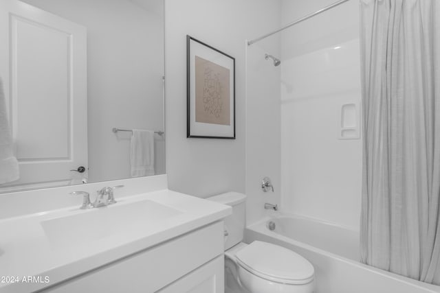 full bathroom featuring vanity, toilet, and shower / bathtub combination with curtain