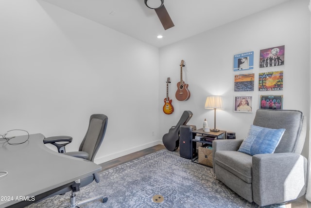 office featuring wood-type flooring and ceiling fan