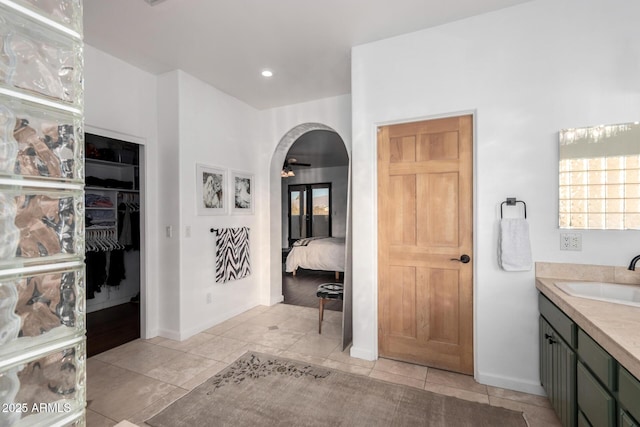 bathroom featuring tile patterned floors and vanity