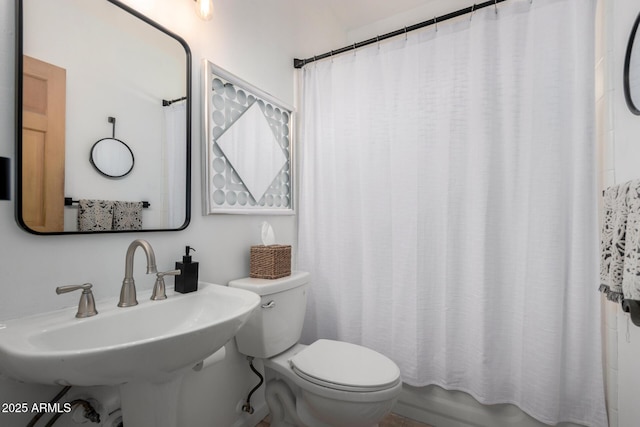 bathroom with sink and toilet