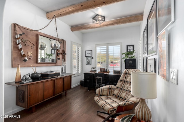 living area featuring dark wood-type flooring and beam ceiling