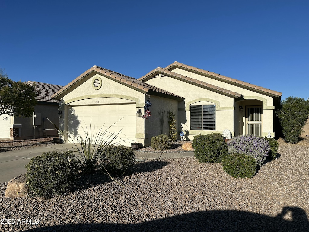 view of front of property with a garage