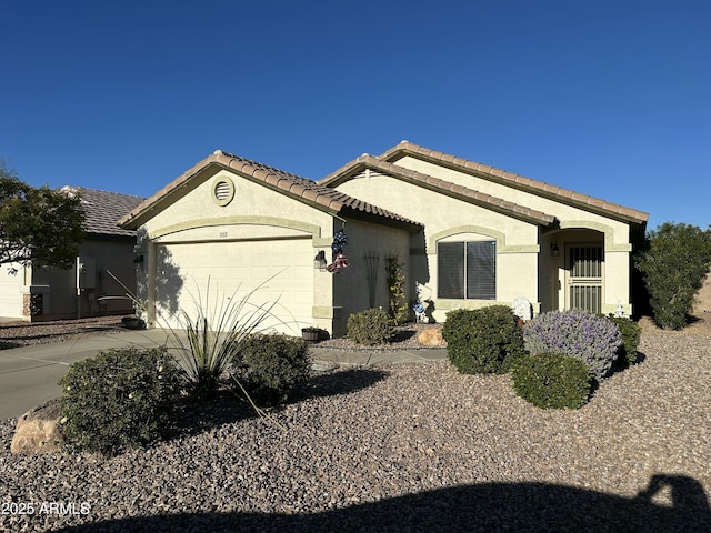 view of front of property with a garage