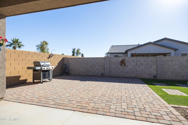 view of patio / terrace featuring a grill