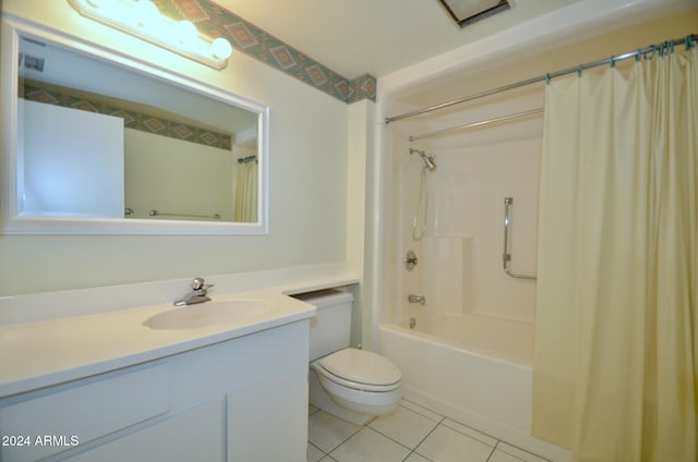 bathroom featuring visible vents, toilet, shower / bath combo with shower curtain, vanity, and tile patterned flooring