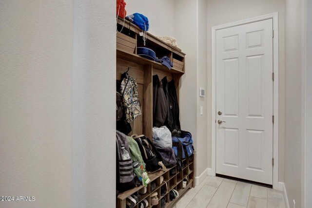 mudroom with light wood-type flooring