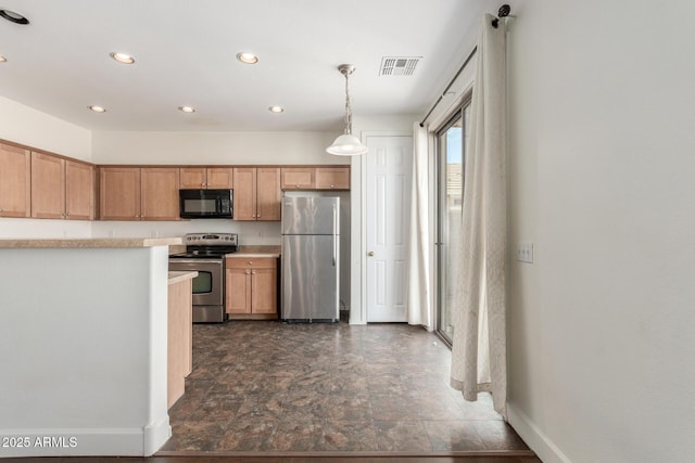 kitchen with recessed lighting, stainless steel appliances, visible vents, hanging light fixtures, and light countertops