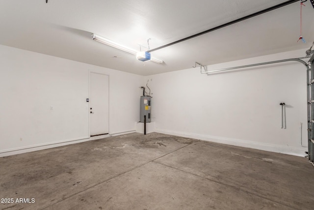 garage featuring a garage door opener, electric water heater, and baseboards