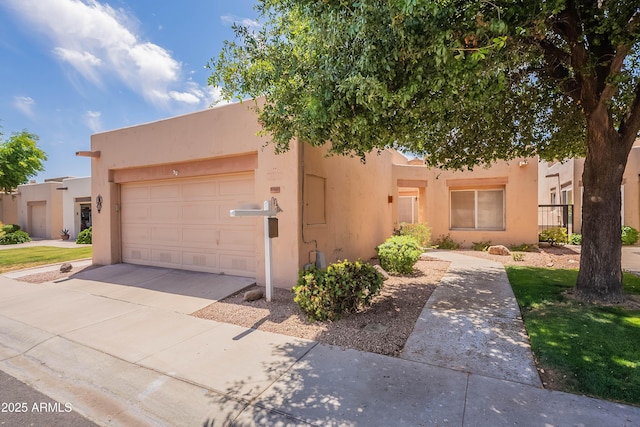17224 N Zuni Trl, Surprise, AZ 85374 - view of front of property with an attached garage, stucco siding, and driveway