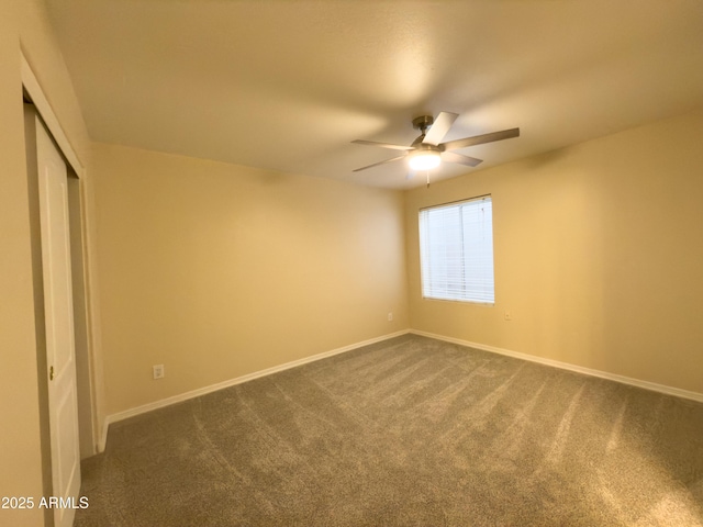 unfurnished bedroom featuring carpet flooring, ceiling fan, and a closet