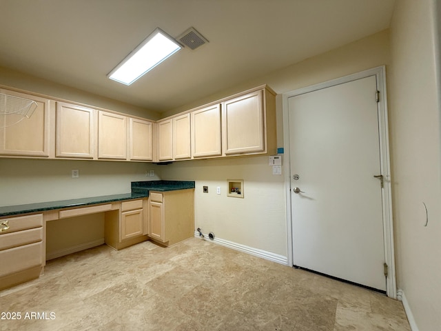 laundry room with washer hookup, electric dryer hookup, cabinets, and gas dryer hookup