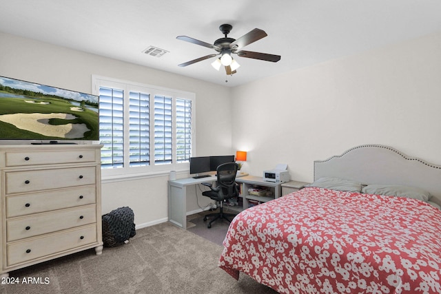 bedroom featuring light colored carpet and ceiling fan