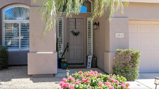 entrance to property with a garage